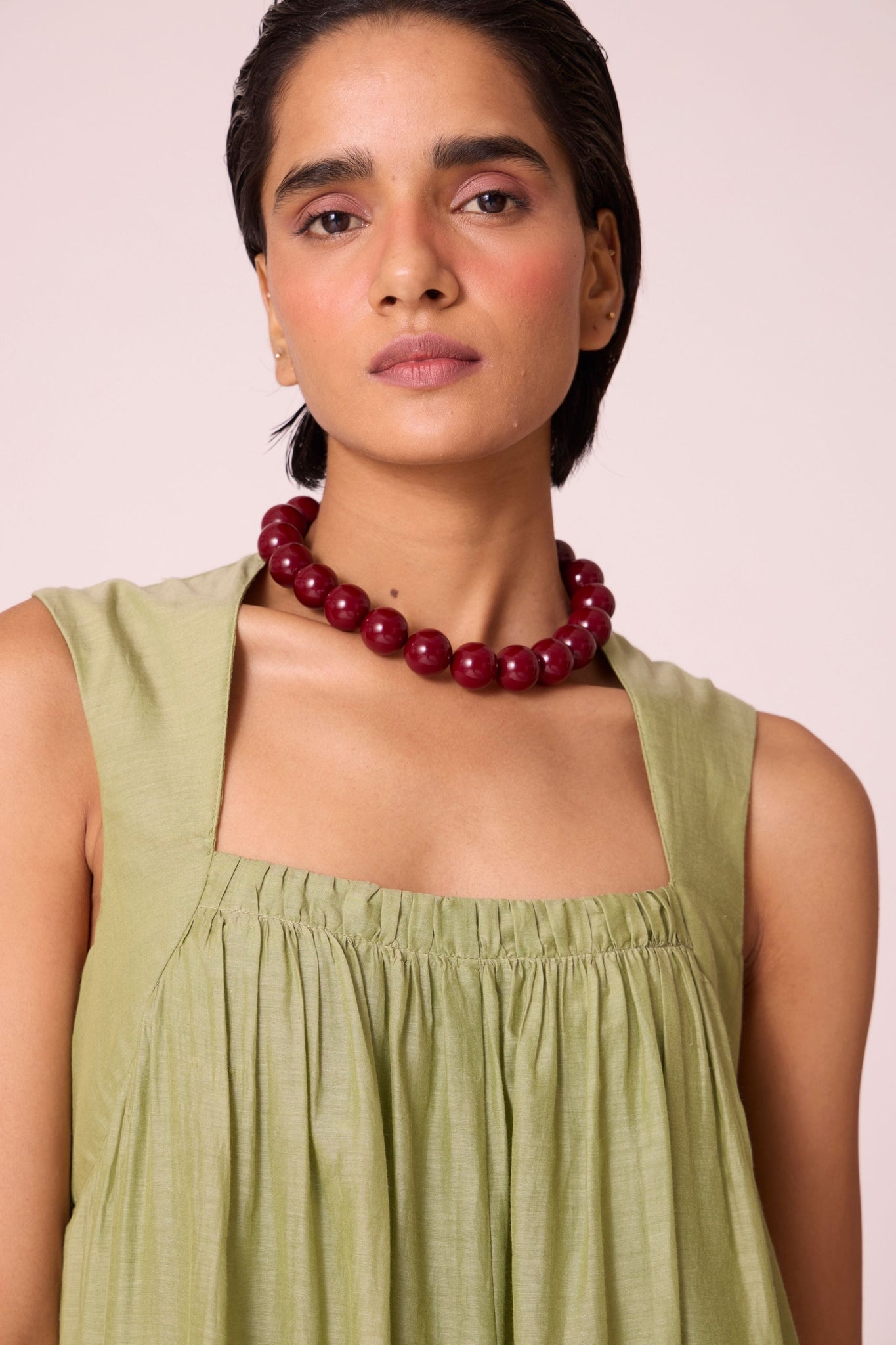 Green silk-cotton maxi dress with square neckline, full lining, in-seam pockets, and concealed side zip.